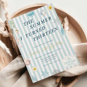 May include: A blue and white striped invitation with the text "THE SUMMER I TURNED THIRTEEN". The invitation features seashell and flower illustrations. The text "Isabella's 13th Birthday" is in gold script.