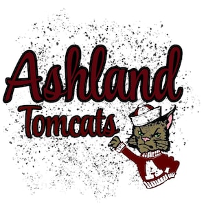 May include: A graphic design featuring the words "Ashland Tomcats" in maroon script with a black outline. A cartoon cat in a sailor hat and maroon sweater with the letter "A" is also featured. The background has a speckled design.
