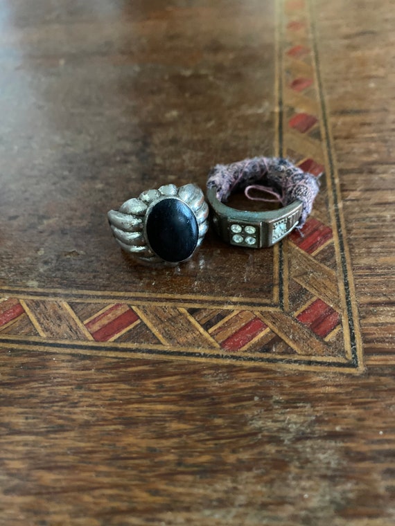 Two old worn costume rings