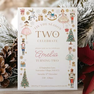 May include: A Christmas-themed birthday invitation. The card features illustrations of ballerinas, nutcrackers, and a Christmas tree. The text reads "'Tis the Season Two Celebrate" and includes the name "Amelia" and the date of the party.