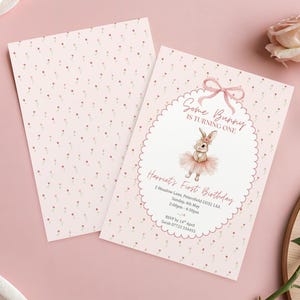 May include: Pink and white invitation card with a bunny illustration. The text reads "Some Bunny is Turning One" and includes event details. The card has a scalloped border and a floral pattern on the back.