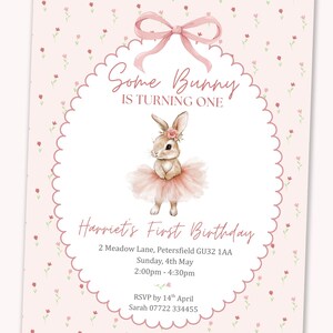 May include: A pink invitation card with the text "Some Bunny is Turning One" and "Harriet's First Birthday". It features a watercolor illustration of a bunny wearing a tutu and a floral crown, with a pink bow at the top.