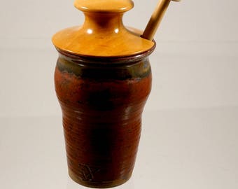 Honey pot with hardwood lid and dipper.