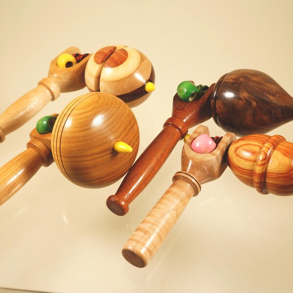 Toy tops. Wood spinning tops with handle. Handmade heirloom toy. Collection of tops.