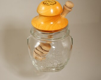 Honey jar with hardwood lid and dipper.