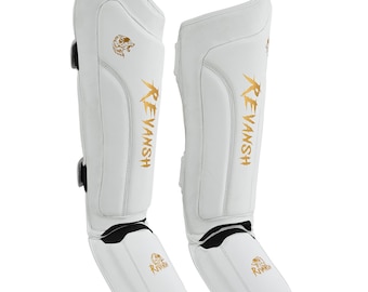 Revansh Sports Matte Rundleer Scheenbeschermers – Wit & Goud MMA Bescherming