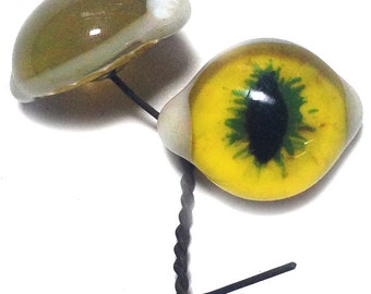 26mm Cat Eyes on wire with white sclera sides. 26mm horizontal/ 20mm vertical
