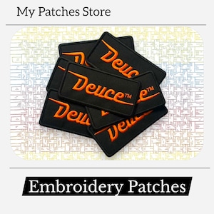 May include: A collection of black rectangular embroidered patches with the word "Deuce" in orange script. The patches are stacked on a patterned background. The text "Embroidery Patches" is at the bottom.
