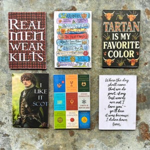 May include: Six rectangular signs featuring Outlander-themed designs. One reads Real Men Wear Kilts over a red plaid pattern. Another shows a stack of book spines, a Tartan Is My Favorite Color sign, a portrait with I Like It Scot, a book grid, and a quote.