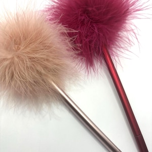 Metallic pluizige gelpen. Clueless-pen