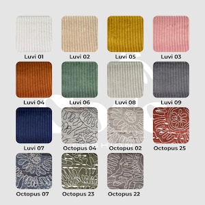 May include: A collection of fabric swatches in various colors and textures. The swatches are labeled with names like "Luvi" and "Octopus" followed by numbers. Colors include white, beige, mustard yellow, pink, orange, green, gray, navy blue, and patterned designs.