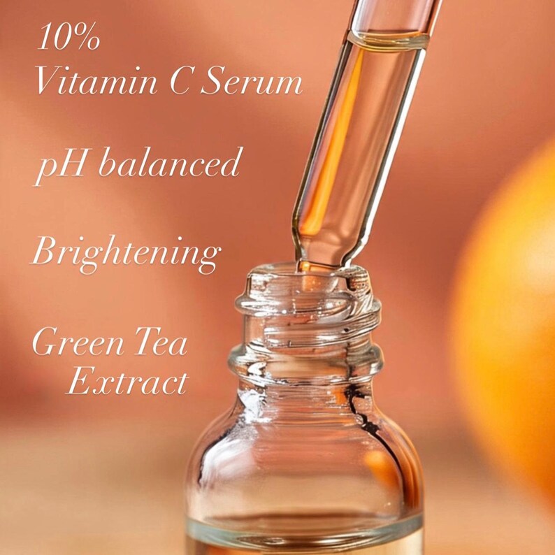 May include: Close-up of a clear glass bottle with a dropper filled with a golden liquid. The bottle is labeled with text including "10% Vitamin C Serum", "pH balanced", "Brightening", and "Green Tea Extract". The background is a blurred orange.