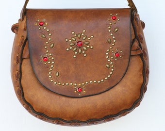 Beautiful vintage handmade, hand tooled, studded/rhinestone boho leather hippie hand shoulder bag.