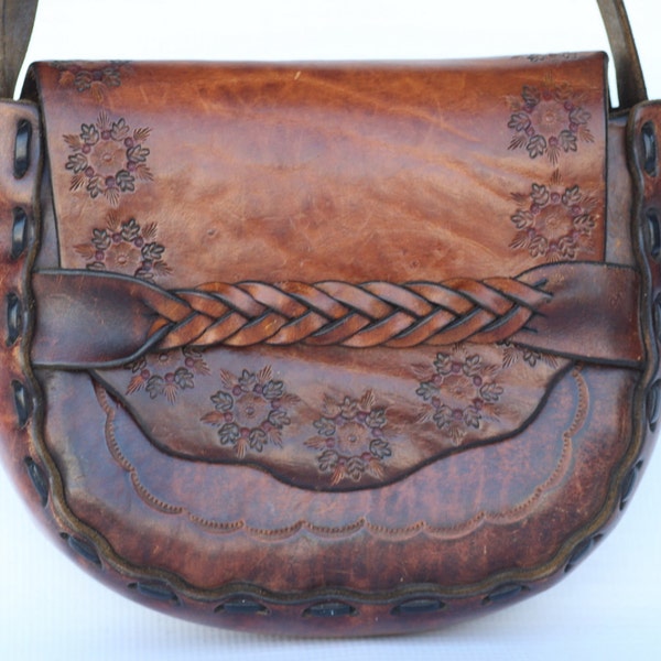 Beautiful 60s hand made hand tooled braided leather boho hippie shoulder bag. Very nice.