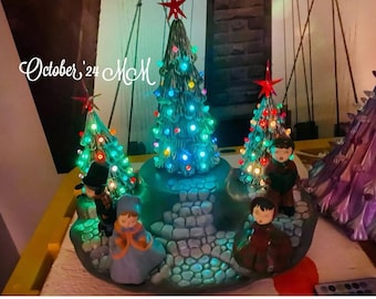 Vintage carolers with new base and trees , battery operated lights used under trees 3 trees , 4 carolers
