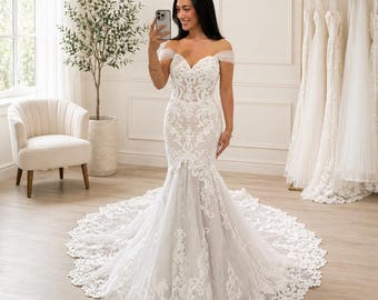 Elegante vestido de novia de sirena con hombros descubiertos, vestido de novia de encaje, escote corazón, cola de tul.