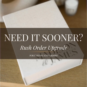 May include: A rectangular off-white box with a textured surface featuring the text NEED IT SOONER? Rush Order Upgrade FOR EXISTING ETSY ORDERS. The box has a partially visible brand name Madison & James printed in a dark serif font on the lid.