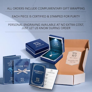 May include: A navy blue jewellery box with an internal LED light containing a silver necklace with a pendant. Included are a thank you card, a diamond certificate booklet, and a branded shipping box with text about gift wrapping and engraving.