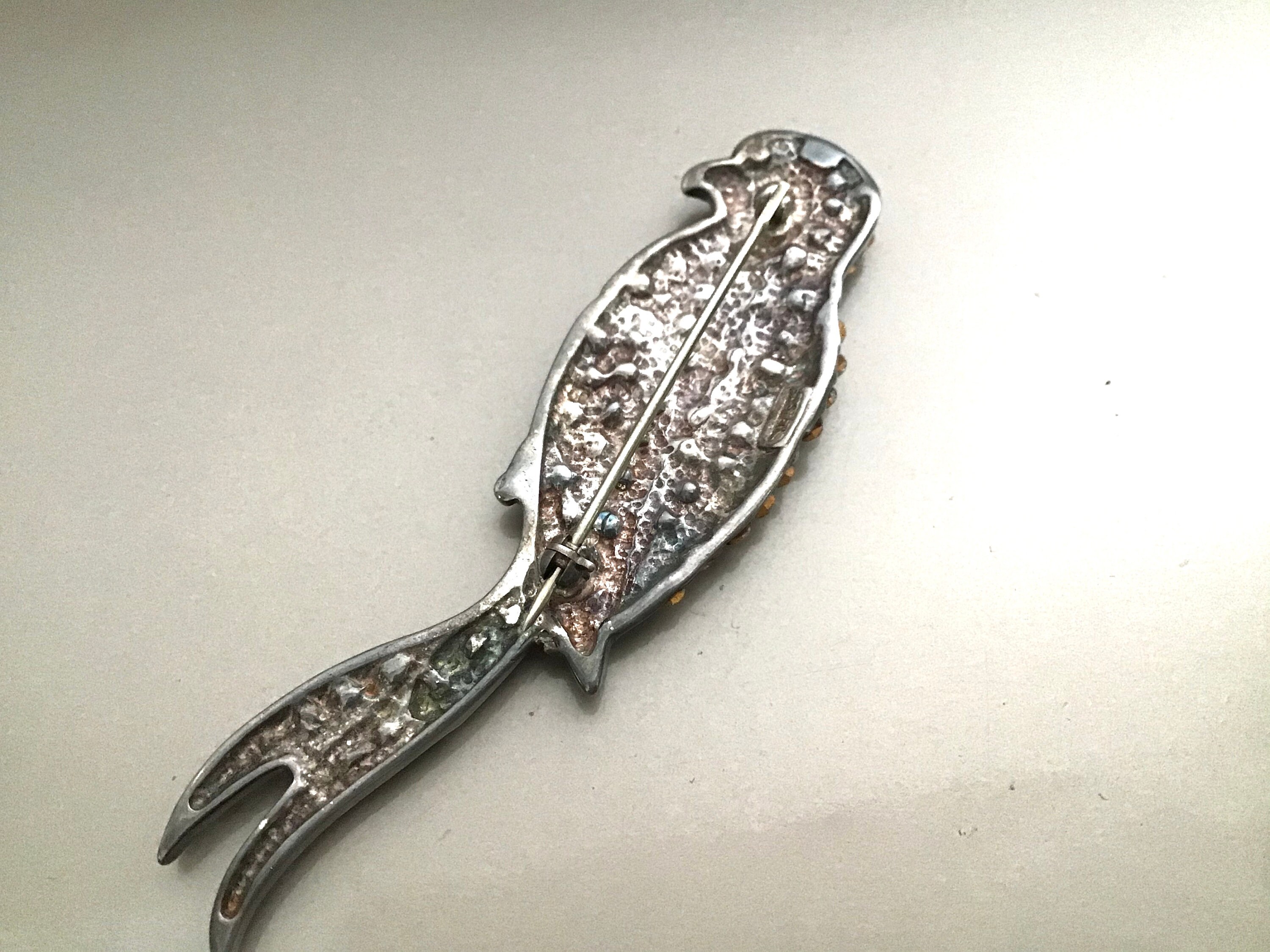Swarovski Crystal bird brooch set in sterling silver – NVISION