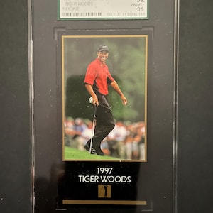 Tarjeta de novato del Masters de Tiger Woods de 1997, SGC 8.5