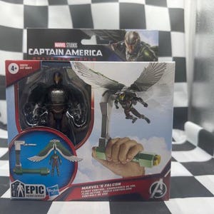 May include: A Marvel's Falcon action figure from the Epic Hero Series, featuring a detailed figure with wings and a flight control device. The packaging includes the Captain America: Brave New World logo and the Avengers logo.