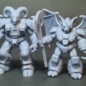 May include: Two unpainted light gray resin miniature figures. The left figure features ram horns and holds a polearm. The right figure has bat-like wings, a single eye lens, and a hook hand. Both figures wear segmented armor plating on their bodies.