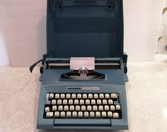 Vintage 1970s to 80s Smith Corona Courier Portable Typewriter