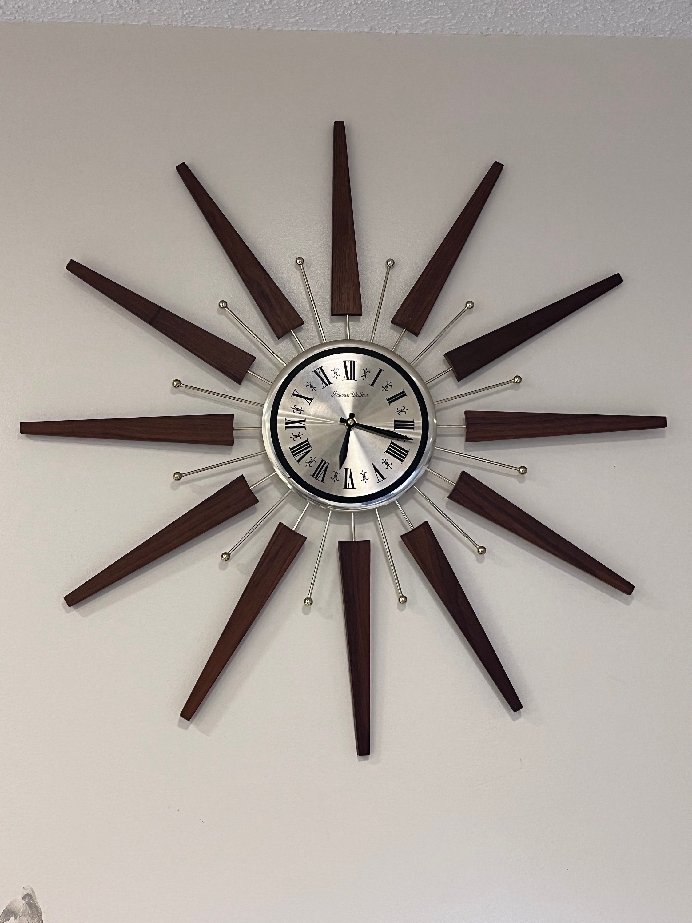 Mid Century Sunburst Form Wall Clock by United C 1950/1960's