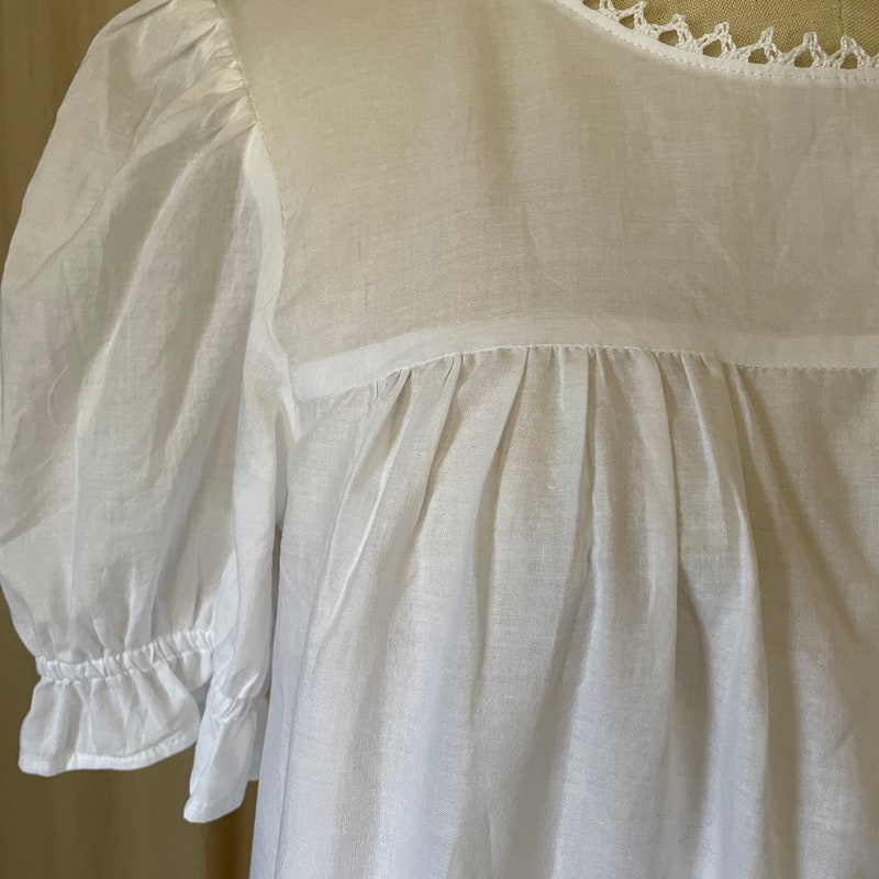 SCOOP BACK HEM DRESS RAISED WITH WOLVES