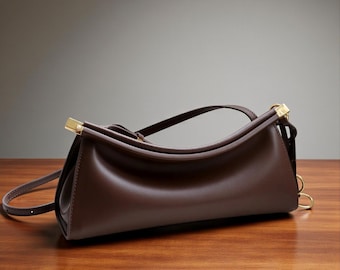 Borsa a tracolla di lusso in pelle di vacchetta francese, versatile e adatta sia per la borsa a clip che per il trasporto a mano.