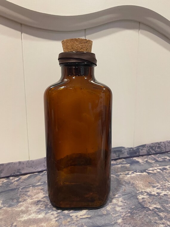 Antike braune Glasflasche