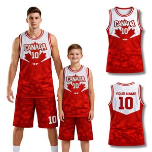 May include: Red and white basketball jerseys and shorts with "CANADA" and a maple leaf graphic. The number "10" is displayed on the front and back of the jerseys and shorts. The jerseys have a white upper section and red lower section.