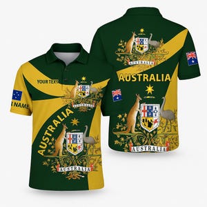 Könnte beinhalten: Grünes und gelbes Poloshirt mit dem australischen Wappen, einschließlich Känguru, Emu und Schild. Das Shirt zeigt das Wort "AUSTRALIA" und die australische Flagge.
