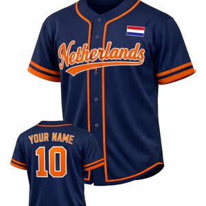 May include: Navy blue baseball jersey with orange accents. The jersey features the word "Netherlands" in orange script across the chest, a small Dutch flag, and the text "YOUR NAME" and the number "10" on the back.