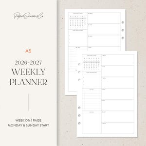 May include: A5 weekly planner with a minimalist design. The planner includes a calendar for January 2026 and 2027, with sections for top priorities, to-do lists, and notes. The text on the cover reads "2026-2027 Weekly Planner".