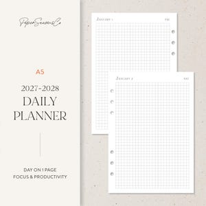 May include: A5 2027-2028 daily planner refill pages by PaperSeasonsCo. The white paper features a grid layout with dates January 1 and January 2, including pre-punched holes for binder rings. Text includes Day on 1 Page Focus & Productivity.