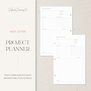 May include: A minimalist project planner with white pages and black text. The design includes the words "Project Planner," "Half Letter," and "Track Tasks & Milestones." Sections are provided for brainstorming, milestones, and action steps.