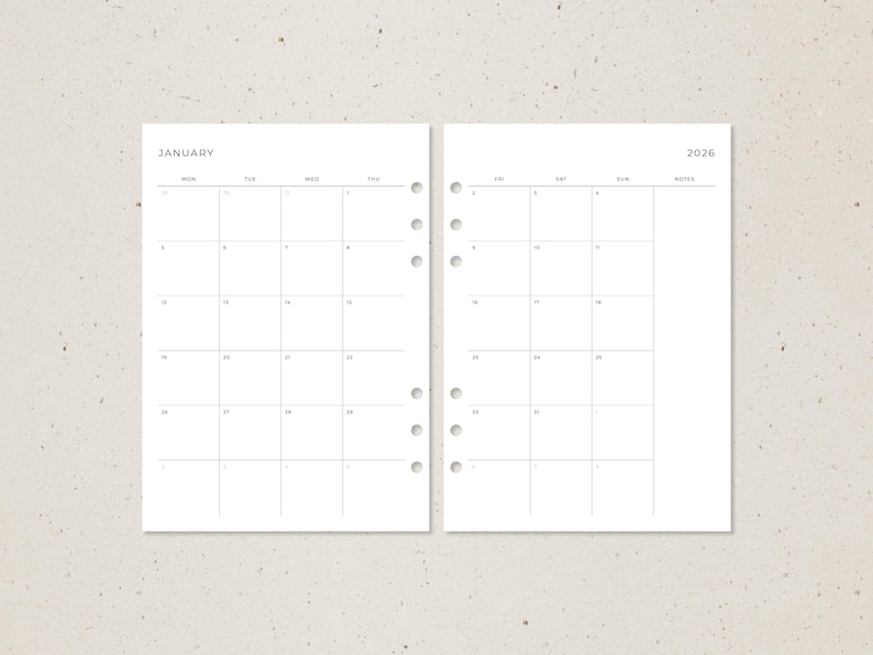 Puede incluir: Una p&aacute;gina doble de planificador minimalista para enero y 2026. La p&aacute;gina izquierda muestra una cuadr&iacute;cula de calendario mensual con los d&iacute;as de la semana en la parte superior. La p&aacute;gina derecha muestra la cuadr&iacute;cula del calendario con espacio para notas.