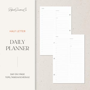 May include: A white daily planner with a minimalist design. The planner includes sections for date, priorities, to-do list, and schedule. The text "HALF LETTER" and "DAILY PLANNER" are visible. The planner is designed for day-on-one-page use.