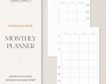 May include: A white monthly planner with a grid layout for each day of the week. The planner includes the text "Paper Seasons Co", "Personal Wide", and "Monthly Planner". The planner is designed with a Monday and Sunday start.