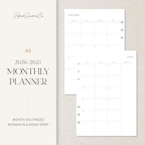 May include: A5 monthly planner for 2026-2027 with a minimalist design. The planner features a month-on-two-pages layout with a Monday and Sunday start. The cover includes the text "Paper Seasons Co" and "MONTHLY PLANNER".