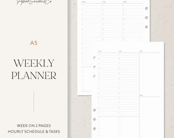 May include: A5 weekly planner with a minimalist design. The cover features the text "Paper Seasons Co" and "WEEKLY PLANNER". The planner includes hourly schedules and tasks, with a week on two pages. The pages are white with gray lines.