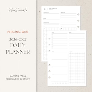 May include: A white daily planner insert with a minimalist design. The planner includes sections for daily focus, mood, productivity, to-do lists, notes, and a workout tracker. The text "PERSONAL WIDE 2026-2027 DAILY PLANNER" is displayed.