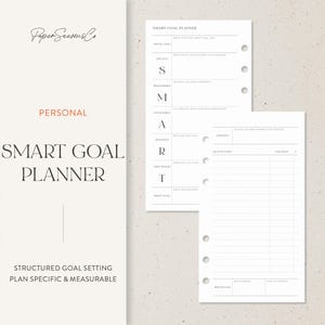 May include: A white SMART GOAL PLANNER with the text "Paper Seasons Co" in the upper left corner. The planner includes sections for initial goals, specific actions, and reflection. The words "PERSONAL" and "SMART GOAL PLANNER" are also visible.