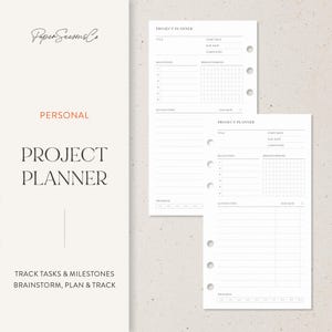May include: White project planner pages with the text "Project Planner" and "Track Tasks & Milestones Brainstorm, Plan & Track." The pages include sections for milestones, brainstorming, and action steps.