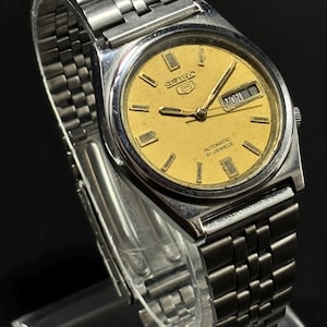 Vintage Seiko 5 heren automatisch 7009A cal 17 juwelen, dag/datum Japans horloge, werkende staat, gouden wijzerplaat