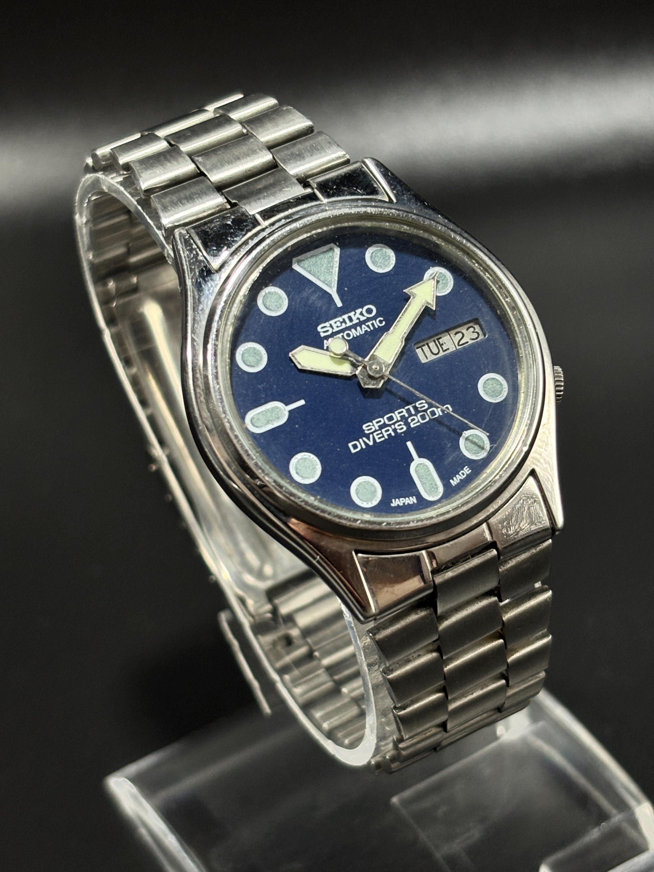 Vintage Restored Seiko 5 Automatic Watch: Japanese Stainless Steel Timepiece