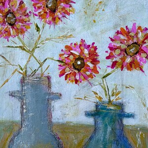 May include: An abstract painting of pink, orange, and yellow flowers in blue vases. The flowers have brown centers and are set against a light blue and tan background. The vases are a muted blue color.