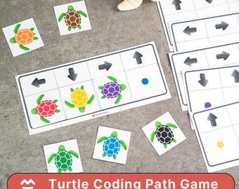 May include: A Turtle Coding Path Game set with colorful turtle cards and path cards featuring arrows. The game includes plush turtle toys. The cards have a grid design with arrows and colored dots. The text "Turtle Coding Path Game" is displayed.