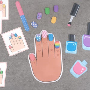 May include: A collection of nail art-themed cutouts, including a hand with painted nails, nail polish bottles, a nail file, and individual nail designs. The nails are painted with various designs, including stripes, hearts, and rainbows.